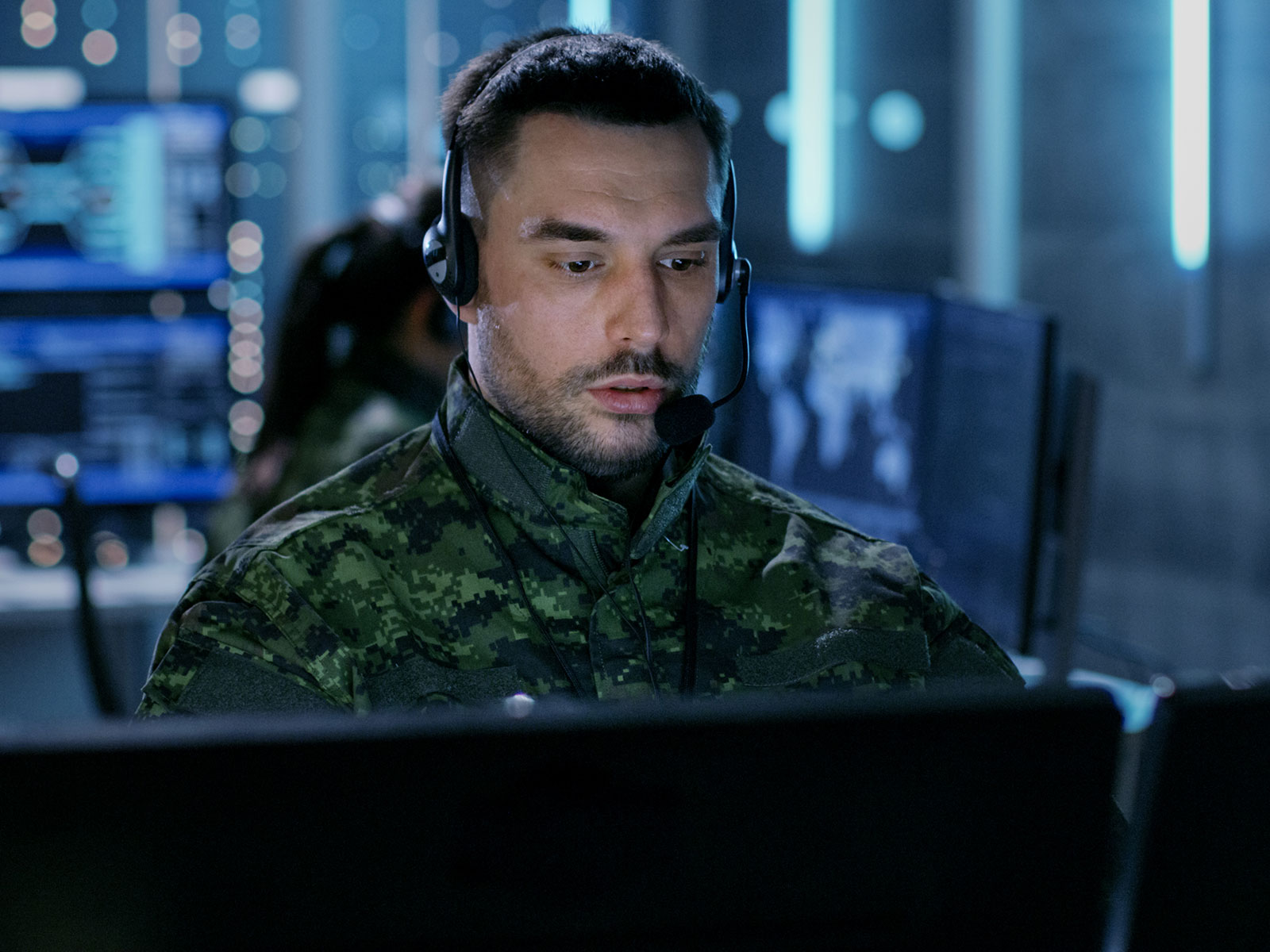 soldier sitting at a computer